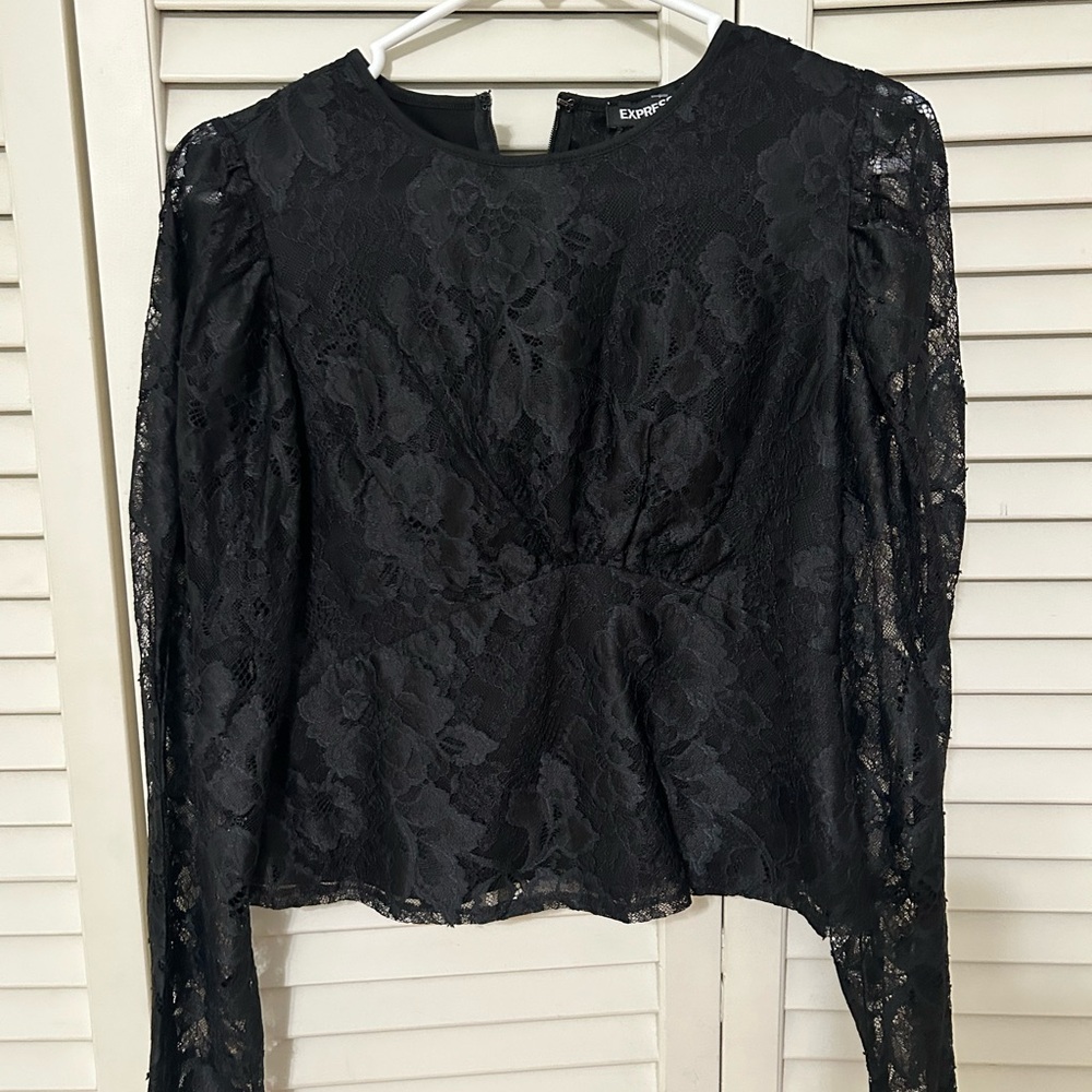 Express long sleeve lace top. Sheer lace sleeves.zipper back. New with tags.